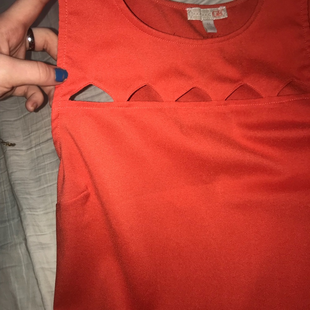 Cute orange top with triangle cutouts! - Picture 4 of 4